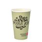 A light green PAPSTAR GmbH cardboard drinking cup "Pure Joy" (Ø 8 cm, 11.7 cm high) with a coffee bean motif and a small red and white label near the bottom, depicted vertically on a white background. The package contains 20 cups.