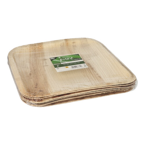 A stack of square PAPSTAR 6 plates, palm leaf “pure” square by PAPSTAR GmbH, packaged in a transparent plastic wrapping with a green-white label on top.