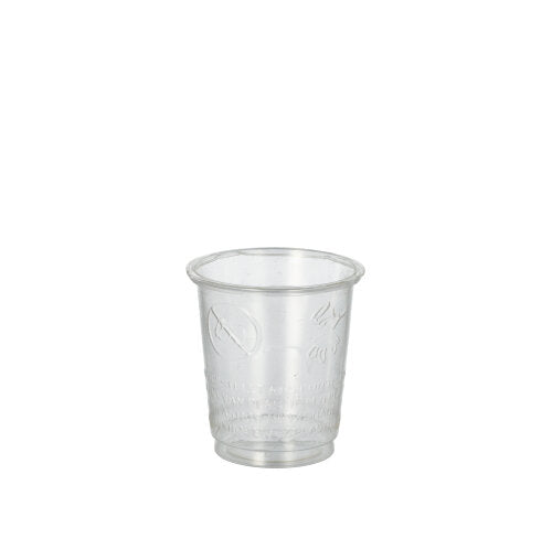 A transparent shot glass from PAPSTAR GmbH, made from crystal-clear PS and PLA "pure", is shown empty on a white background. The cup is one of 40 from the PAPSTAR 40 glasses for shot set and features subtle grooves at the bottom area.