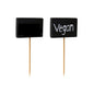 Pictured are two rectangular black PAPSTAR finger food picks (8.5 cm) on wooden sticks - one without, one with "Vegan" in white lettering. Perfect for buffets and parties. From the PAPSTAR GmbH, pack of 20, upright on a white background.