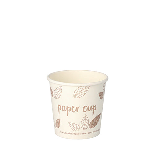 A beige PAPSTAR GmbH 80 drinking cup, cardboard "pure" cardboard cup with brown leaf motifs and "cardboard cup" text. This environmentally friendly disposable drinking cup is presented against a plain white background.