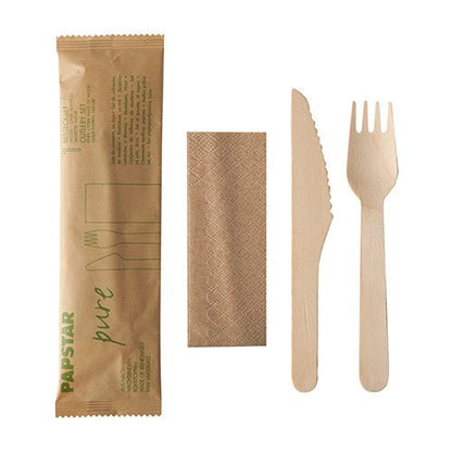 The PAPSTAR cutlery set wood "pure" by PAPSTAR GmbH contains a knife, fork, and napkin made of wood in a paper bag - ideal for sustainable events.
