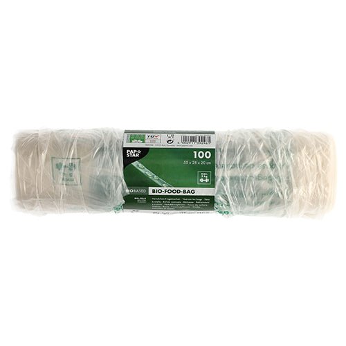 A roll of 100 PAPSTAR shirt carrier bags made of transparent bio-film (knot bags) is packaged in film and bears a green and white label with product details and environmentally friendly symbols.