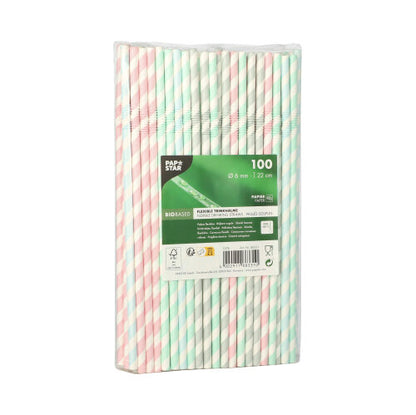 A sealed package with 100 PAPSTAR 100 straws, paper Ø 6 mm from PAPSTAR GmbH in pastel pink, white, and green stripes. The label contains product information and barcodes in multiple languages.