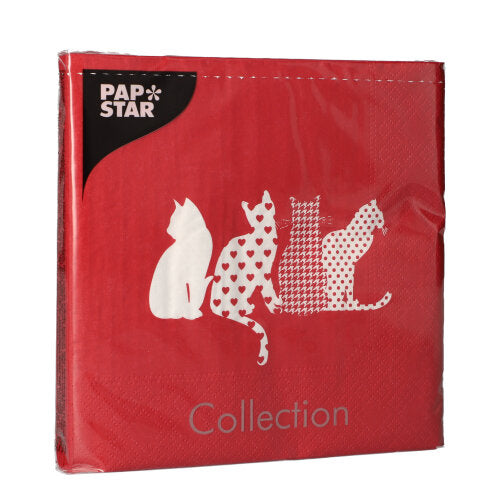 The PAPSTAR 20 napkins (33x33 cm, 3-ply, red) from PAPSTAR GmbH feature four white cat silhouettes in various designs, adding a playful accent to the set table.