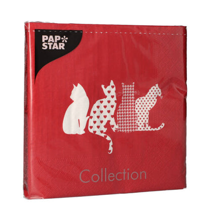 The PAPSTAR 20 napkins (33x33 cm, 3-ply, red) from PAPSTAR GmbH feature four white cat silhouettes in various designs, adding a playful accent to the set table.
