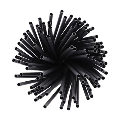 A bundle of PAPSTAR 100 straws, paper Ø 6 mm from PAPSTAR GmbH stands vertically in a circular arrangement, viewed from above, on a white background.