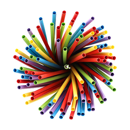 A bundle of PAPSTAR 100 straws, paper Ø 6 mm from PAPSTAR GmbH, circularly arranged and viewed from above on a white background. The eco-friendly paper straws are color-sorted: red, yellow, green, blue, and purple.