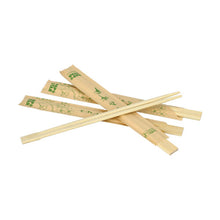 Several pairs of PAPSTAR GmbH chopsticks bamboo "pure", 21 cm, each individually wrapped in foil, are spread out on a white background; some pairs have sleeves with green motifs and text.