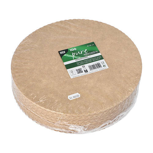 A stack of round, brown, biodegradable cardboard plates from PAPSTAR GmbH with the inscription "PAPSTAR 100 cake boards, cardboard 'pure' round" is packed in clear foil and provided with a green-white label with the inscription "Product information and gastronomy quality".