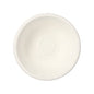 A simple, round white bowl seen from above against a white background, similar to PAPSTAR 50 bowls made from biodegradable sugarcane "pure" white by PAPSTAR GmbH.