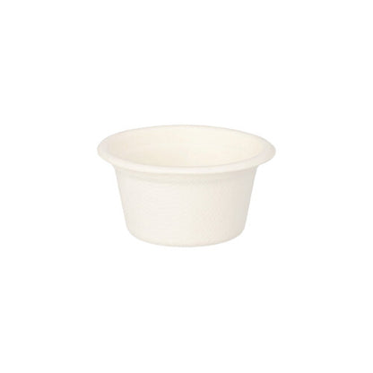 The PAPSTAR dressing bowls sugarcane "pure" Ø 6 cm, white (set of 12) by PAPSTAR GmbH are environmentally friendly, biodegradable and seen as white cardboard bowls isolated on a white background.