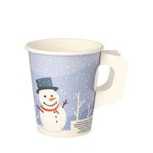 The PAPSTAR mug with handle (Ø 8 cm, cardboard, "Snowman" film, 50 pieces) from PAPSTAR GmbH has a flat, white cardboard handle and a delightful snowman motif with a snowy background.