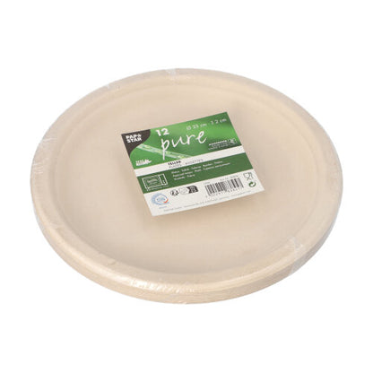 A pack of twelve PAPSTAR 12 plates, sugarcane "pure" undivided from PAPSTAR GmbH, beige and biodegradable, packed in plastic with a green-white label with the brand, product information, eco-statements and recycling symbols.