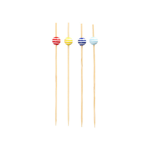 Four PAPSTAR 100 Fingerfood - Picks from PAPSTAR GmbH are shown vertically with a round, striped bead in the colors red, yellow, dark blue, and light blue from left to right on a white background.
