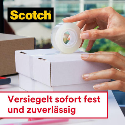 A person seals a white box with Scotch® Crystal Tape (transparent, value pack, 8 rolls, 19 mm x 33 m) from 3M Deutschland GmbH. The logo is visible in the top left, below it says: "Instantly firm and reliably sealed."