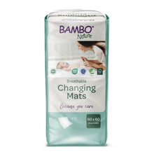 A 10-pack of Bambo Nature changing pads, 60x60 cm with super absorber from Abena Re-Seller GmbH is marked with eco-friendly symbols on the packaging.