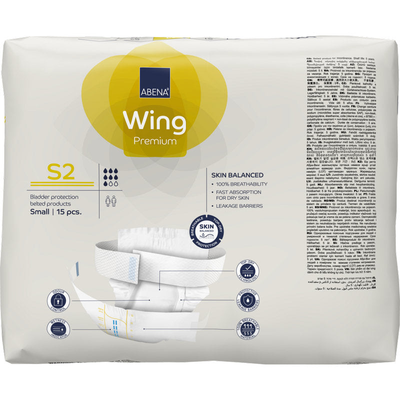 Eine 15er-Packung ABENA Wing Premium der Abena Re-Seller GmbH in der Größe Small hat eine überwiegend weiße Verpackung mit gelben Akzenten, einer Produktinformation, dem Text "Schutz und Komfort" und einer Produktabbildung auf der Vorderseite.
