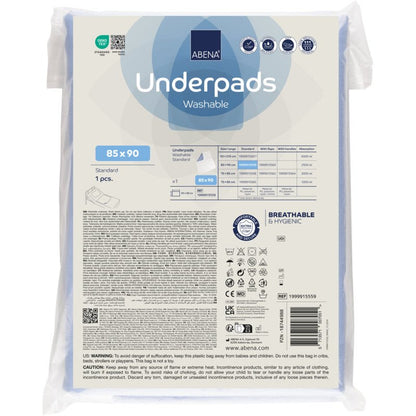A box of Abena Re-Seller GmbH washable pads, 90x85 cm, light blue (30 packs) is shown with product information, usage instructions, and symbols for hygiene and breathability on the packaging.