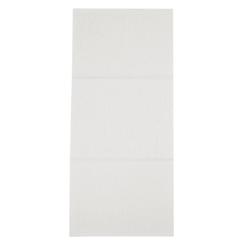 An unfolded rectangular disposable towel, airlaid, white from Abena Re-Seller GmbH lies flat on an even surface with visible crease marks.