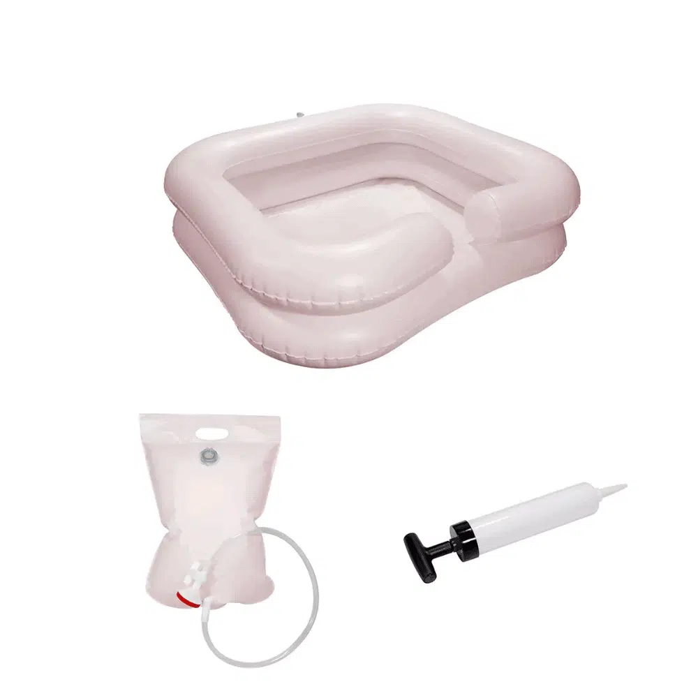 The discontinued item: AMPri washbasin with shower device and pump, inflatable by AMPri Handelsgesellschaft mbH with hand pump and water bag is presented for hair washing while lying down on a white background.