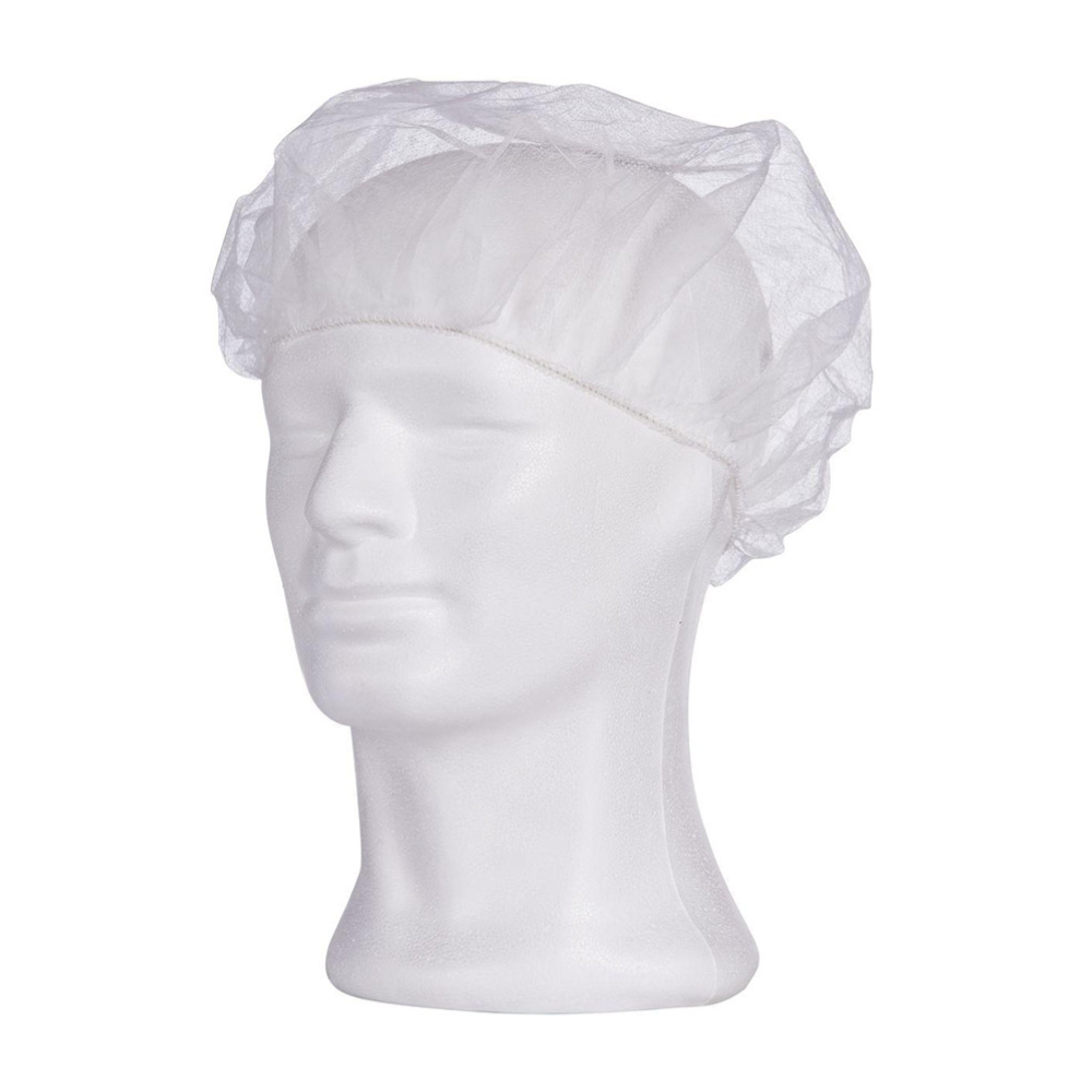 A white AMPri MED-COMFORT beret cap from AMPri Handelsgesellschaft mbH is seen on a white mannequin head. This disposable cap is ideal for hygienic processes in food processing and covers the top and sides of the head with its thin, transparent material. The mannequin head remains plain and unobtrusive against a simple, white background.