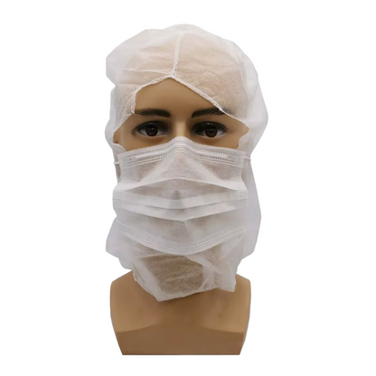 A mannequin head is equipped with a white disposable face mask and an AMPri MED-COMFORT PP astronaut hood that extends over the forehead and neck, completely enclosing the head. This depiction shows how these disposable protective covers, available from AMPri Handelsgesellschaft mbH, would look when worn.