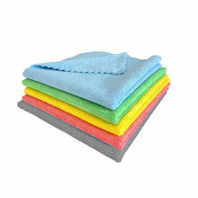 A stack of five Arcora SUPER-LINE XL microfiber cloths 38x38cm from Arcora International GmbH in the colors blue, green, yellow, pink, and gray lies on a white background. The top blue cloth is neatly folded at the corner to facilitate cleaning.