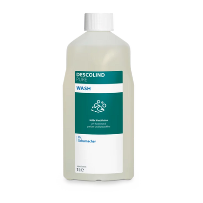 Dr. Schumacher Descolind Pure Wash Lotion by Dr. Schumacher GmbH in a 1-liter plastic bottle, pH-neutral and perfume-free for sensitive skin, with a white cap and green-white label with product information and hand wash symbol.