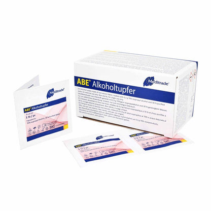 A box (100 pieces) of Meditrade alcohol swabs 30 x 30 mm, two-layered white non-woven fabric from MaiMed GmbH for skin cleansing and disinfection. Product labels and text are in German.