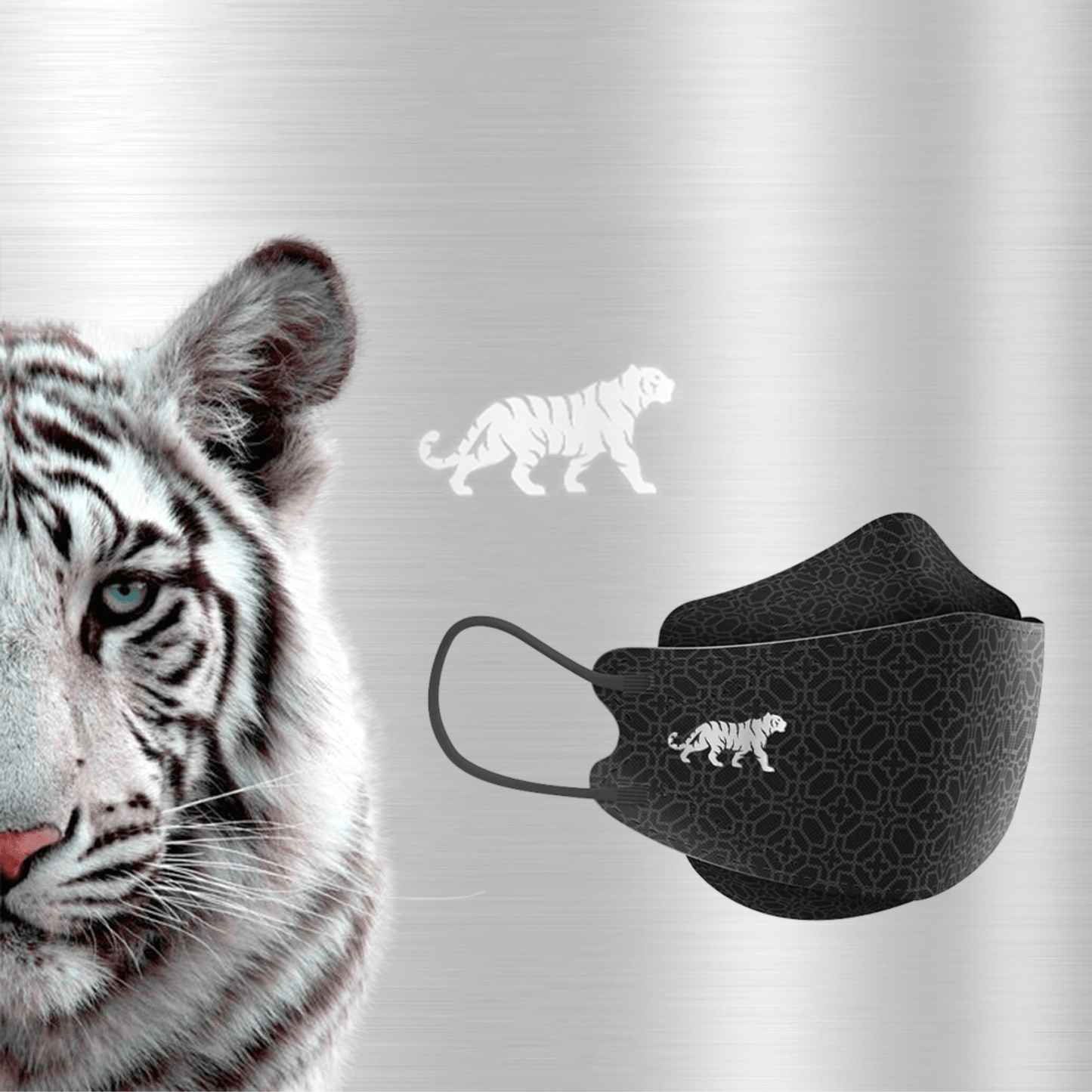 The image shows a close-up of a white tiger with distinctive stripes. Next to the tiger is an Altruan designer face mask that meets the FFP2 standard and features a matching tiger design. The background is a subtly textured metallic silver.