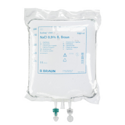 A transparent plastic bag labeled "B. Braun Ecobag® CE Click NaCl 0.9% rinsing solution" from B. Braun Deutschland GmbH & Co. KG contains 5,000 ml of saline solution with two sealed ports; available in a carton with 2 packs (2 x 5,000 ml).