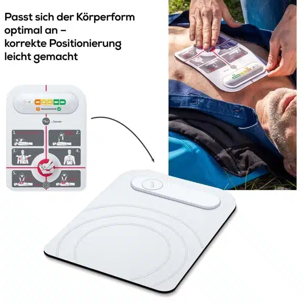 A close-up shows a person lying outdoors while someone applies an innotas discontinued item: Beurer LifePad® resuscitation aid (1 piece) on the chest. The image also shows a diagram for the correct placement of the pad.