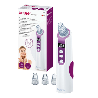 Here is an image of the packaging of the Beurer FC 41 pore cleaner. The elegant white device features a purple accent and a digital display and operates with advanced vacuum technology. It includes three removable attachments designed to effectively combat skin impurities. The packaging contains product information and shows a picture of a smiling woman. This product is offered by Beurer GmbH in a package with one piece.