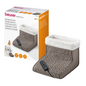Displayed is a packaged Beurer FWM 45 massage foot warmer from Beurer GmbH. The white box shows a picture of the product and a woman using it. The foot warmer is made of gray knit with white plush lining and a black control unit for adjustable heat levels. The product name "Beurer FWM 45 Massage Foot Warmer | Package (1 piece)" is printed in several languages.