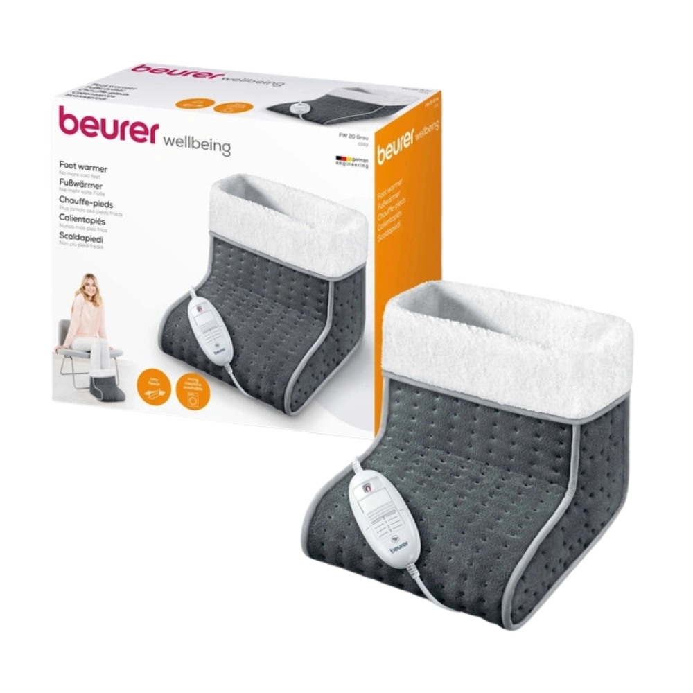 Image of the Beurer FW 20 Cosy grey foot warmer by Beurer GmbH. The product is gray with a white edge and features a control unit with 3 temperature settings, certified according to OEKO-TEX® STANDARD 100. The packaging in the background shows an image of the foot warmer as well as a multilingual text describing its use.