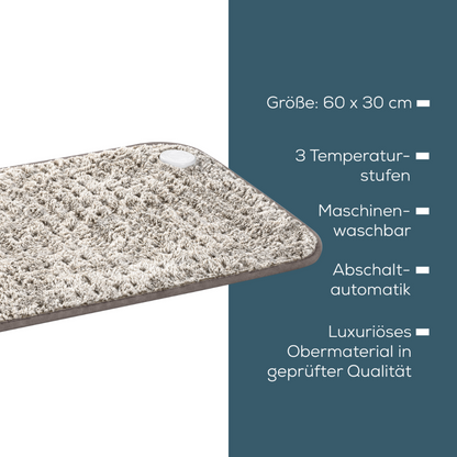 A heating mat labeled Beurer HK 123 XXL Nordic heating pad is shown with a textured surface and a control button in the corner. The text lists features including an XXL format of 60 x 30 cm, 3 heat settings, machine washability, automatic shut-off, and high-quality luxurious material. The background is gray and blue.