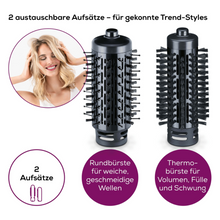 Image with two interchangeable hairbrush attachments for the Beurer HT 80 Rotating Hot Air Brush from Beurer GmbH. The left attachment, a round curling brush for soft waves, is shown next to the right attachment, a thermal brush for volume and bounce. The text is in German and describes the features.