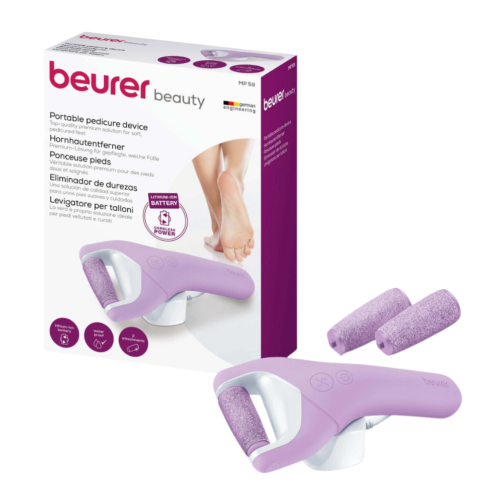 Image of a packaged Beurer MP 59 Wet & Dry Callus Remover by Beurer GmbH next to the actual device in lavender color with two additional roller heads. The packaging shows images of the product, a foot, and descriptions in multiple languages. This callus remover features a diamond coating for effective skin removal.