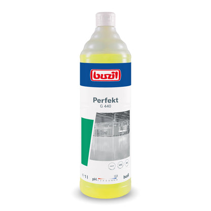 A 1-liter bottle of Buzil Perfekt G 440 Alkaline Intensive Power Cleaner Floor Cleaner from BUZIL-WERK Wagner GmbH & Co. KG is perfect for treating oil and grease-containing surfaces. The label combines blue, white, and green accents with a cleanroom image showing the pH value and usage symbols, and is sealed with a white cap.