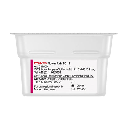 A rectangular 80 ml CWS ParadiseLine Washroom Fragrance for Fragrance Dispenser Paradise Air Bar labeled "CWS Flower Rain" with product, company, and contact information as well as instructions for use. Made in Germany. Valid: 05/19. Batch: 123456. Ideal as a washroom fragrance.