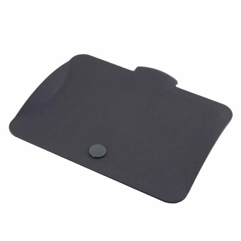 A black rectangular TASKI lid for wipe boxes from Diversey Deutschland GmbH & Co. OHG made of robust plastic with rounded corners and functional tabs is depicted lying flat on a white background.