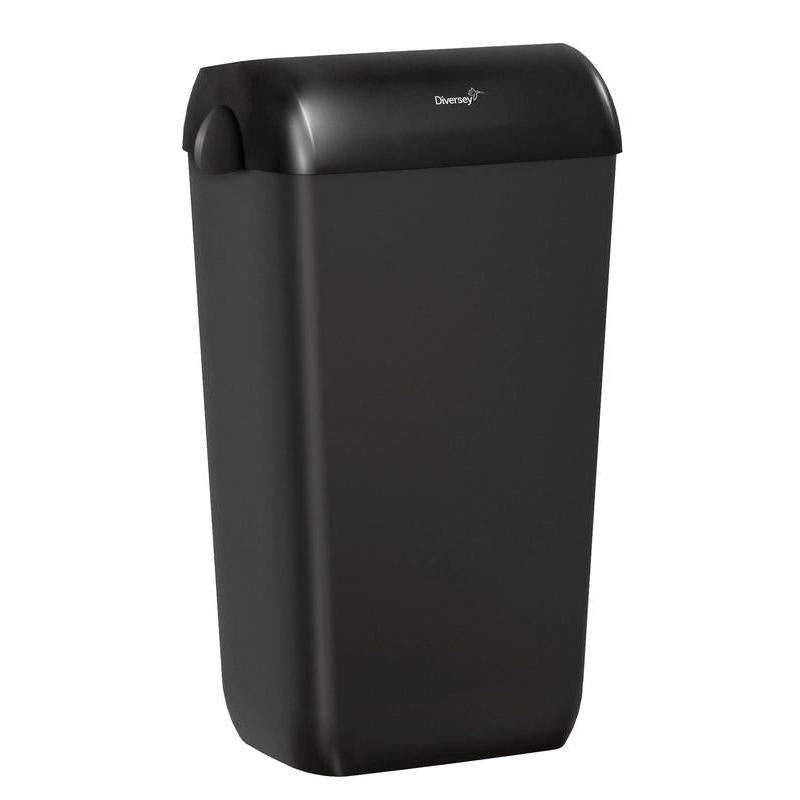 The waste container with a half-open lid, 23 L from Diversey Deutschland GmbH & Co. OHG is a black, rectangular plastic container with a sleek design and Diversey logo on the front - ideal for easy waste disposal.