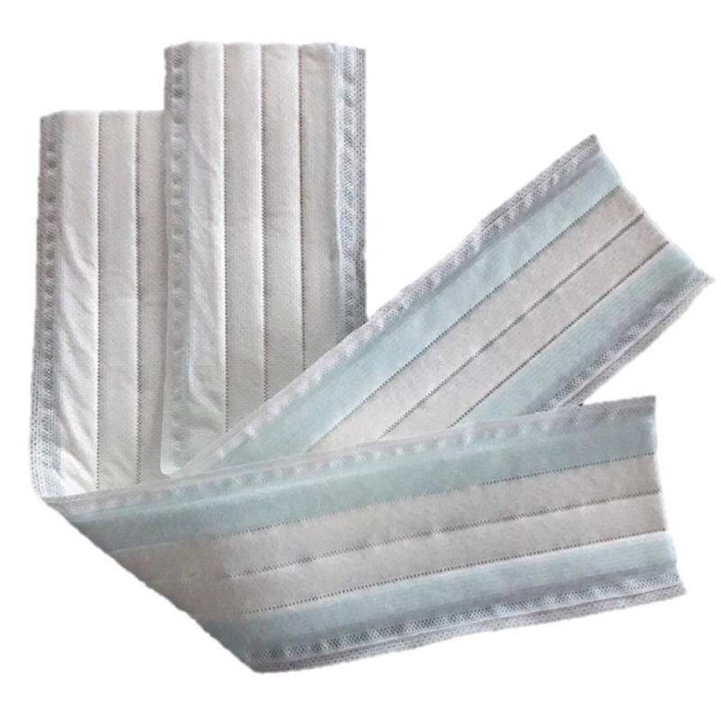 Three TASKISUM Glide 40 cm disposable microfiber mops from Diversey, each with improved glide and ~24m² coverage, are arranged and slightly overlapping in the image - to demonstrate their arrangement for professional cleaning. The package contains 25 pieces.