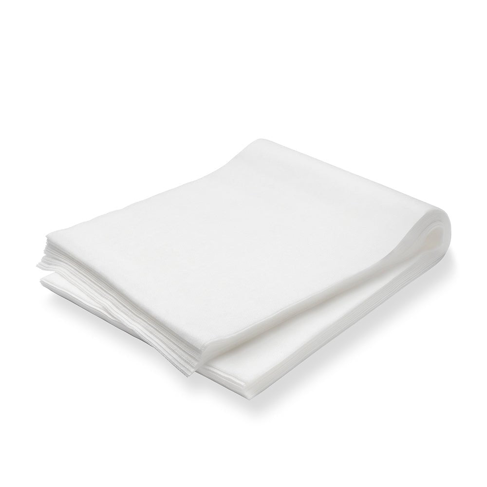 A pack of 100 TASKI dust cloths (60 x 25 cm, oil-soaked) from Diversey Deutschland GmbH & Co. OHG is neatly stacked on a white surface - ideal for daily care and dust removal on coated and uncoated floors.