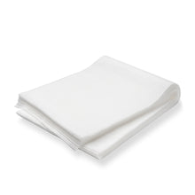 A pack of 100 TASKI dust cloths (60 x 25 cm, oil-soaked) from Diversey Deutschland GmbH & Co. OHG is neatly stacked on a white surface - ideal for daily care and dust removal on coated and uncoated floors.