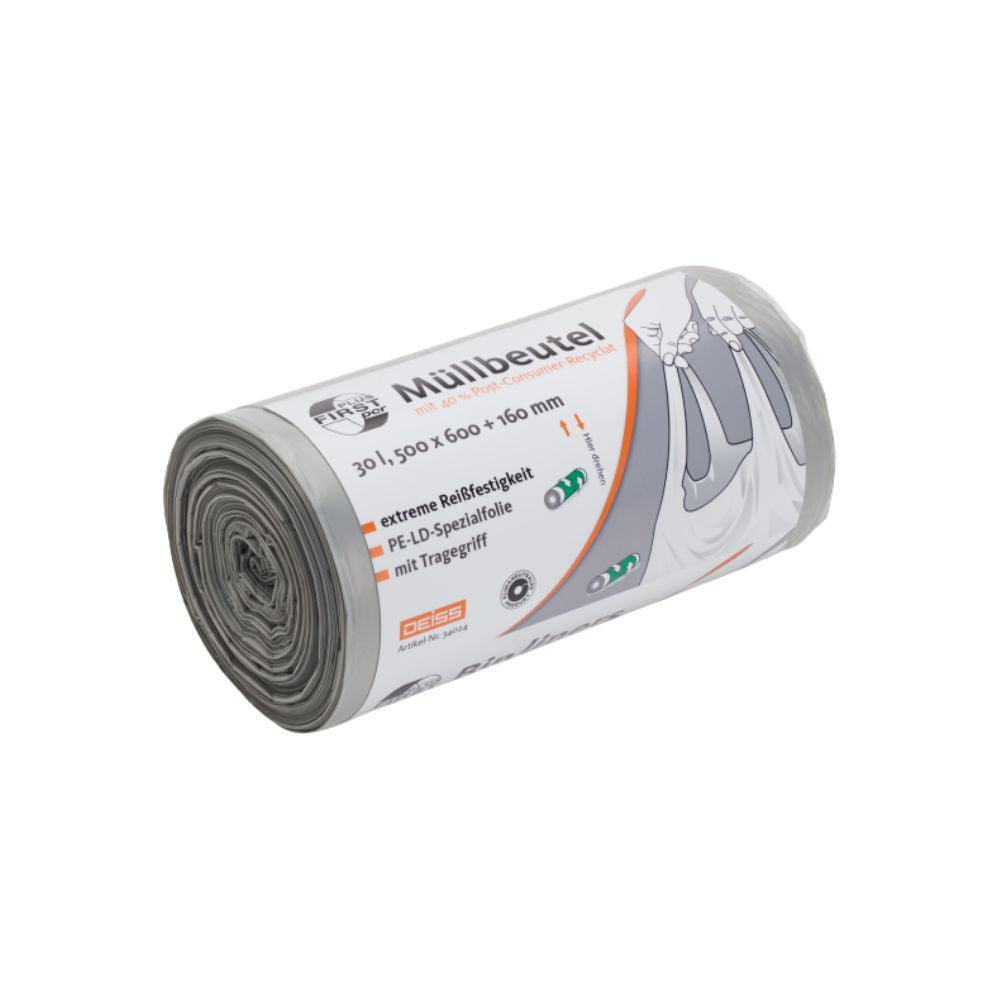 Pictured is a roll of DEISS First Plus Pcr garbage bags 30 liters, 34044 with carrying handles and the inscription "garbage bags." These bags offered by EMIL DEISS KG (GmbH + Co.) are made of LDPE and have a capacity of 30 liters. They are characterized by high tear resistance and measure 500 x 600 + 160 mm. They offer durability and comfort for daily use.