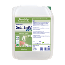 Ein weißer Behälter mit der Aufschrift „Dr. Schnell GRÜN & MILD ECO ergiebiges ökologisches Handspülmittel“ der DR.SCHNELL GmbH & Co. KGaA zeigt Produktdetails, Zertifizierungen wie die HACCP-Bescheinigung und eine Weinglasgrafik. Dieser hautmildes Spülmittelbehälter fasst 10 Liter Flüssigkeit.