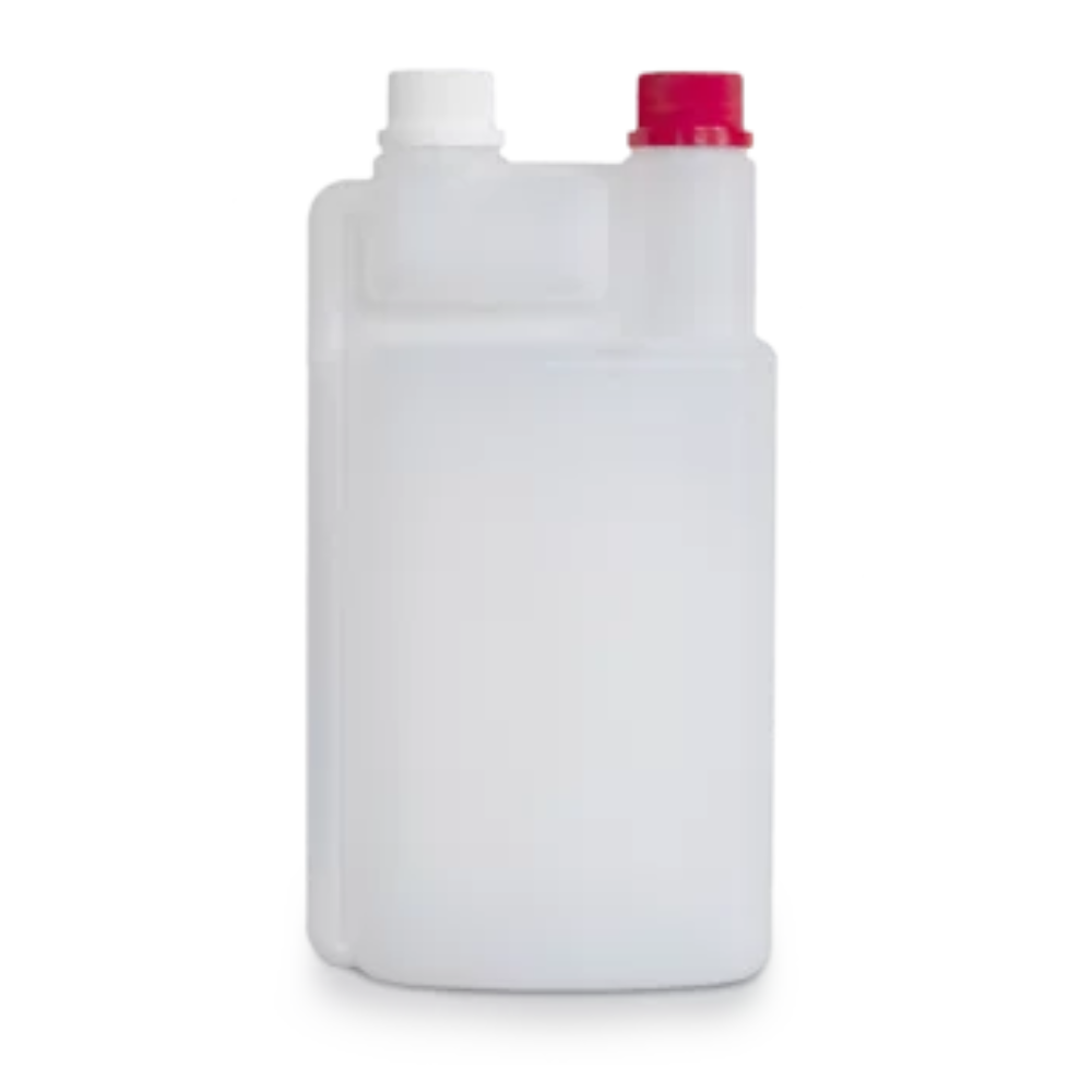 A translucent, white plastic dosing bottle Dr. Schumacher - 1000 ml with a 60 ml chamber by Dr. Schumacher GmbH with two caps on top. The larger cap is white and the smaller cap is red. This rectangular 1000 ml bottle has smooth edges and a fill level indicator on the side.
