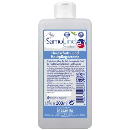 A 500-ml bottle Dr. Schnell SamoLind Sensitive 2in1 skin protection and care cream from DR.SCHNELL GmbH & Co. KGaA with German text, blue-white label, symbols for vegan and sensitive skin, and enriched with glycerin for additional care.